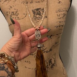 PRICE CUT 
Crown Pendant Necklace with Brown Tassel Tan glass beads